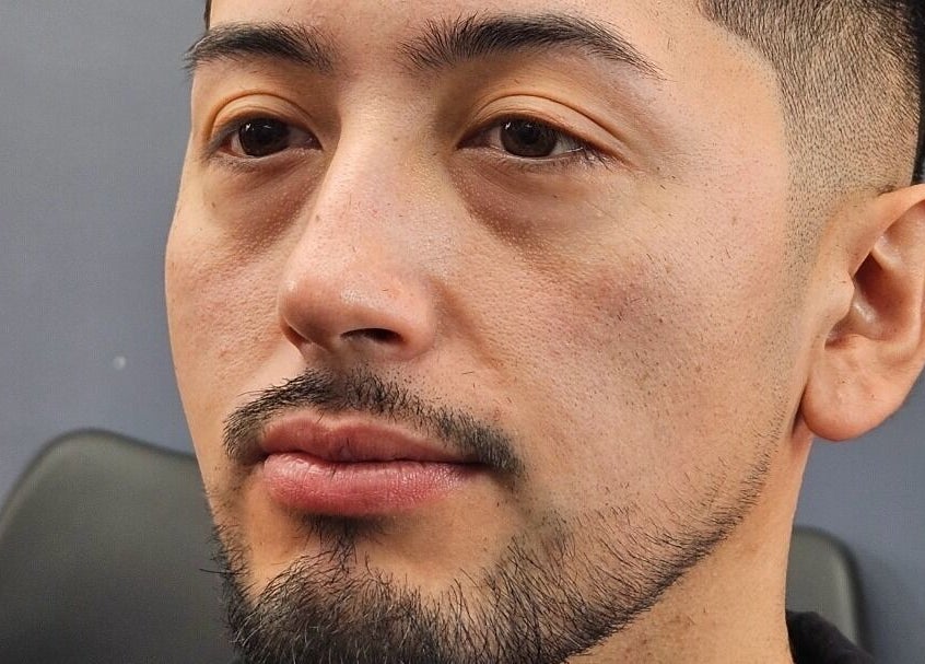 Perfil de cliente en Castillo barbers, Talca, Maule, CL, mostrando un corte y barba estilizados.