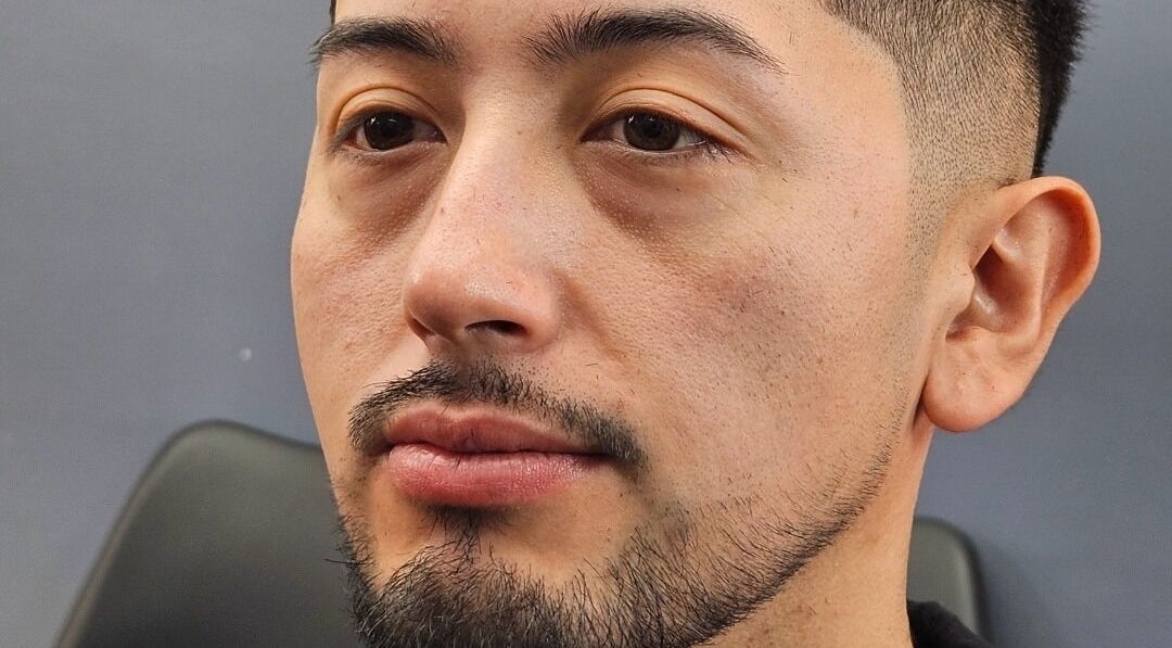 Perfil de cliente en Castillo barbers, Talca, Maule, CL, mostrando un corte y barba estilizados.