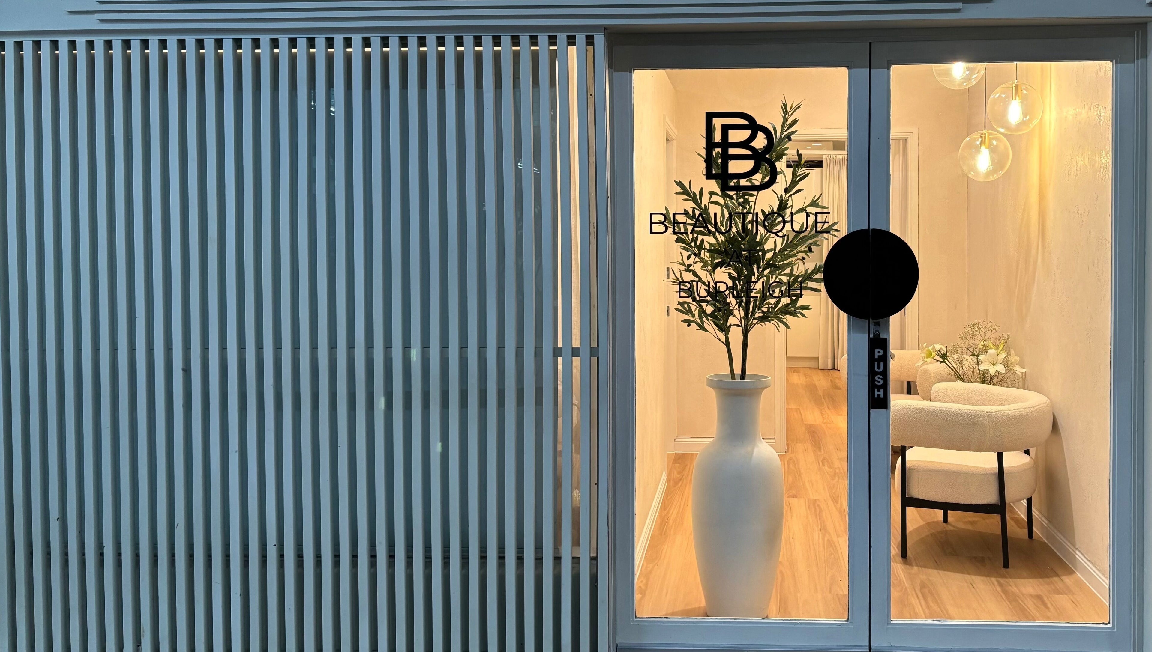 NailsbyMalie entrance showcasing modern decor at Burleigh Heads, Queensland, AU.