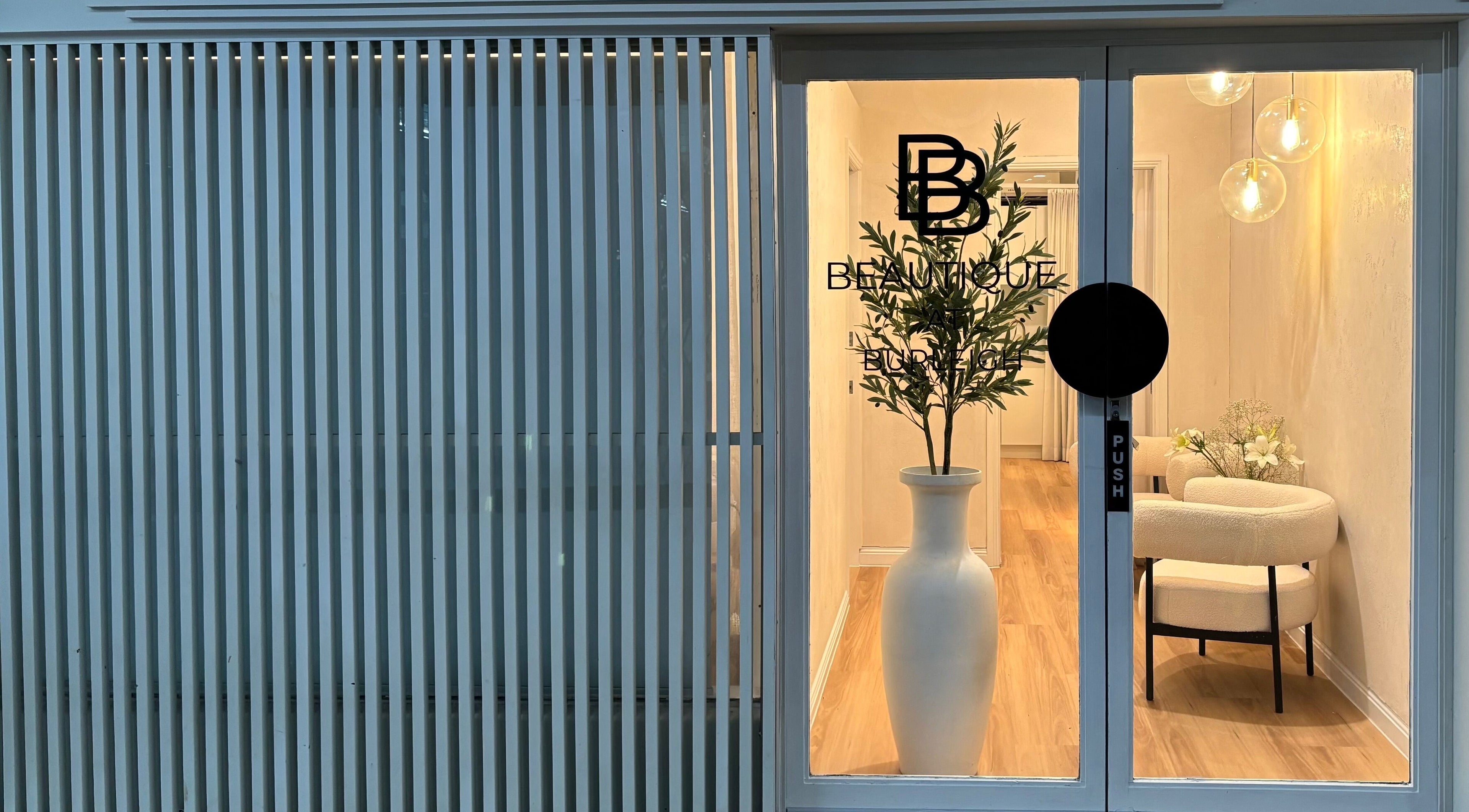 NailsbyMalie entrance showcasing modern decor at Burleigh Heads, Queensland, AU.