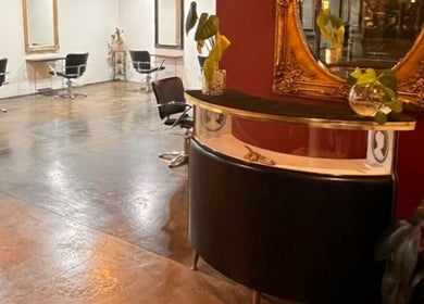 Chic interior of Hair Maverick, Melbourne, Victoria, AU with stylish chairs and mirrors.