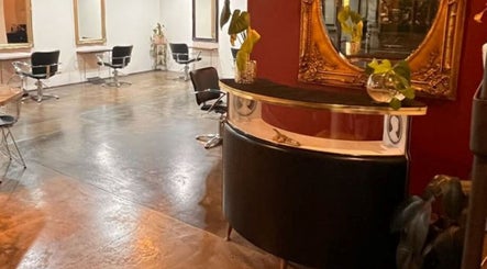 Chic interior of Hair Maverick, Melbourne, Victoria, AU with stylish chairs and mirrors.