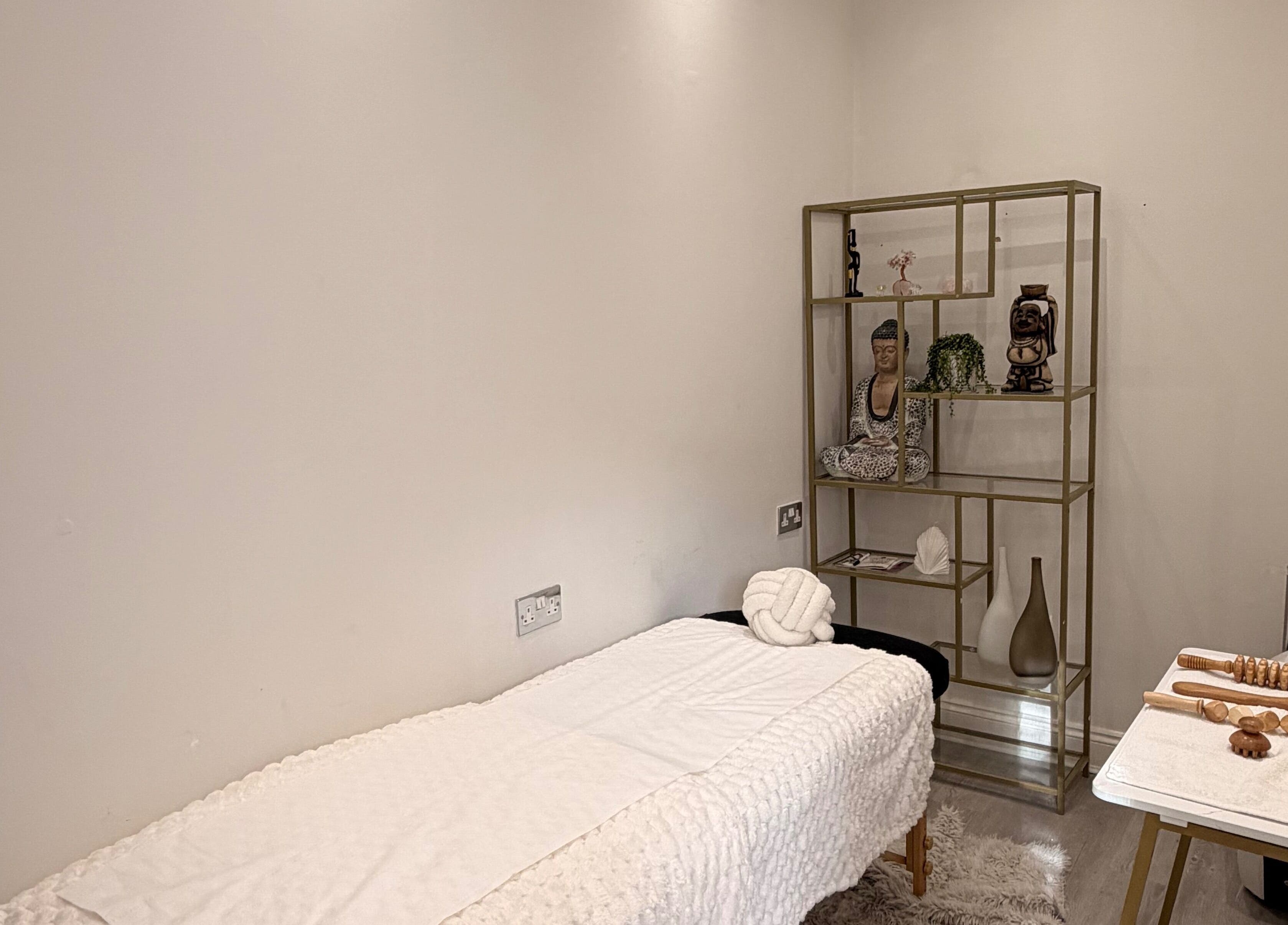 Tranquil massage room at MOOD SKIN & AESTHETICS, Barnet, England, GB, featuring a serene ambiance with elegant decor.