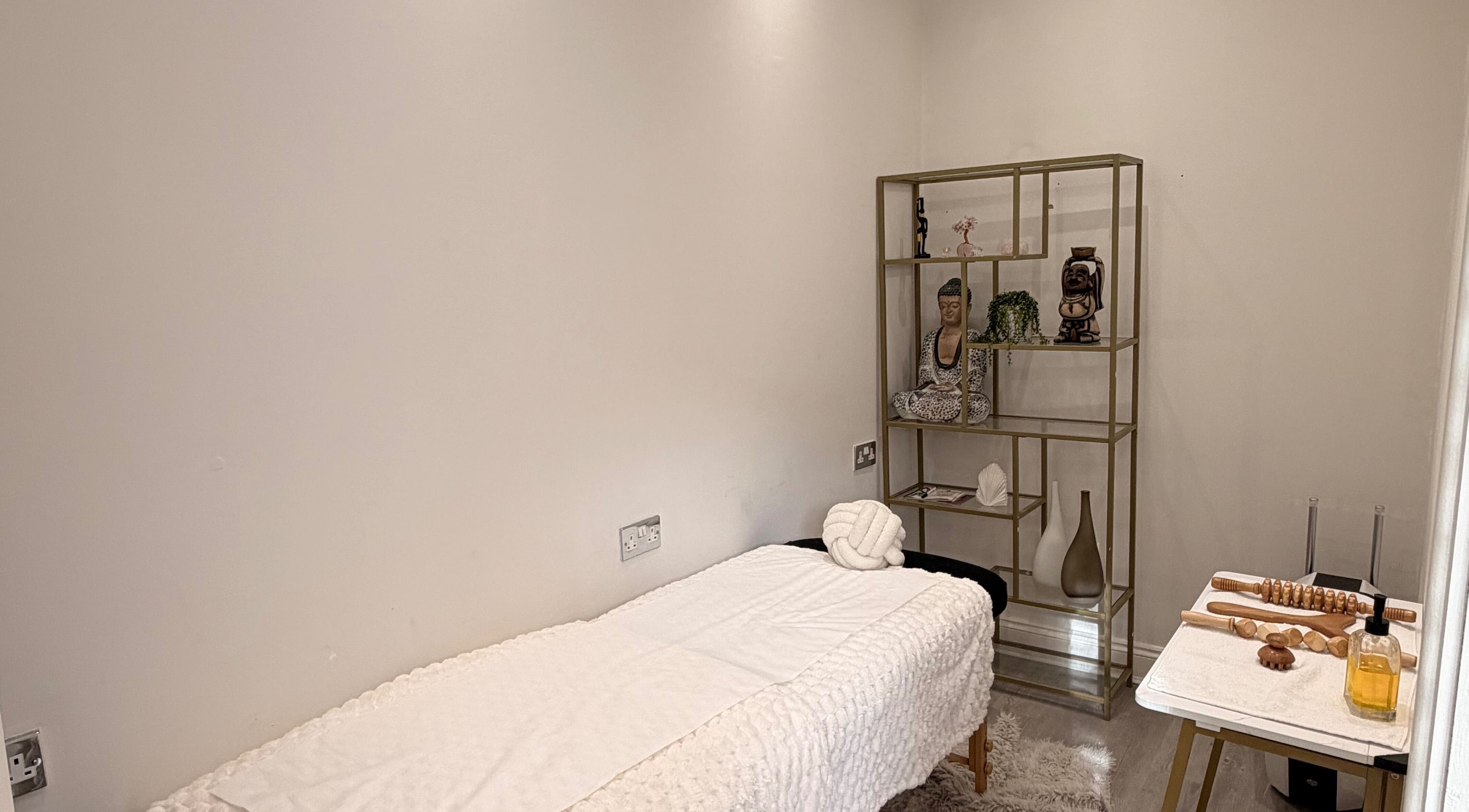 Tranquil massage room at MOOD SKIN & AESTHETICS, Barnet, England, GB, featuring a serene ambiance with elegant decor.