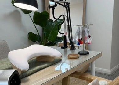 A stylish nail station at Iz Does Nails, Todmorden, England, GB, featuring modern decor and equipment.