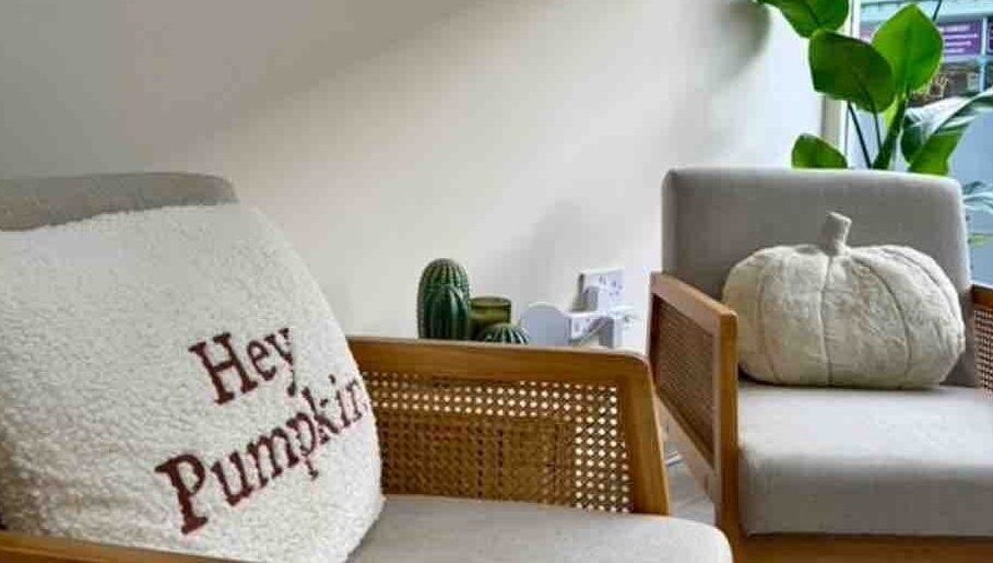 Cozy seating area at Iz Does Nails, Todmorden, England, GB with stylish decor.