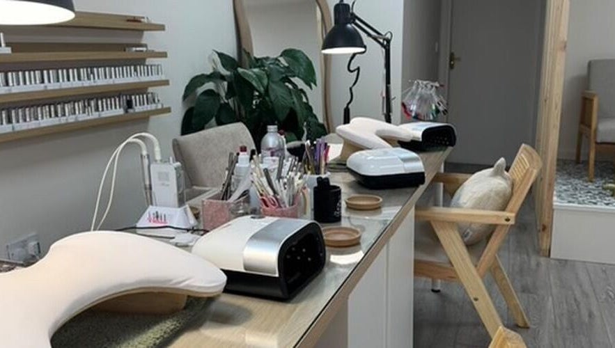 Iz Does Nails in Todmorden, England, GB offers a cozy nail service station with manicure tools and modern decor.