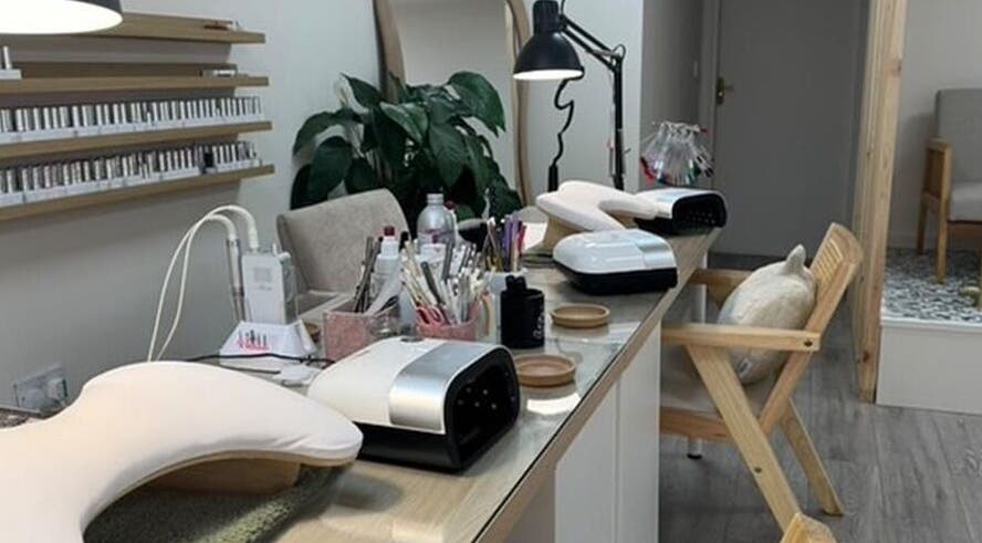Iz Does Nails in Todmorden, England, GB offers a cozy nail service station with manicure tools and modern decor.