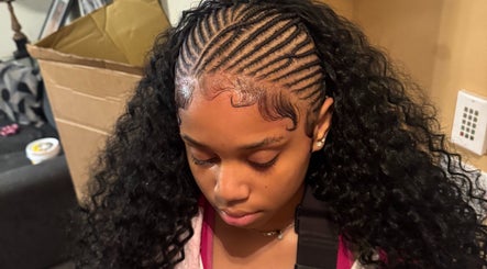 Elegant braided hairstyle at Braids by Tipp in Atlanta, Georgia, US, showcasing stunning craftsmanship.