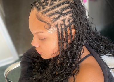 Intricate braids styled at Braids by Tipp in Atlanta, Georgia, US, showcasing a stunning hair design.