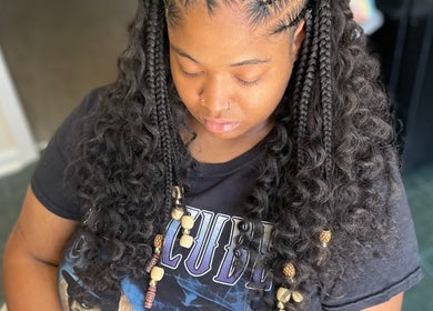 Intricate braids styled at Braids by Tipp, Atlanta, Georgia, US, showcasing detailed hair craftsmanship.