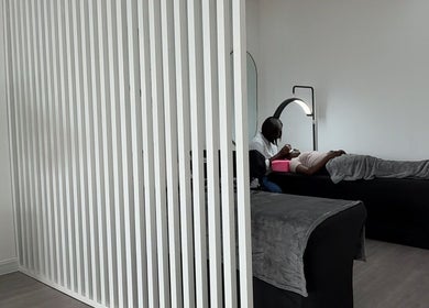 Relaxing lash extension session at Lush&luxe studio, Accra, Greater Accra Region, GH with cozy interior.