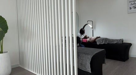 Relaxing lash extension session at Lush&luxe studio, Accra, Greater Accra Region, GH with cozy interior.
