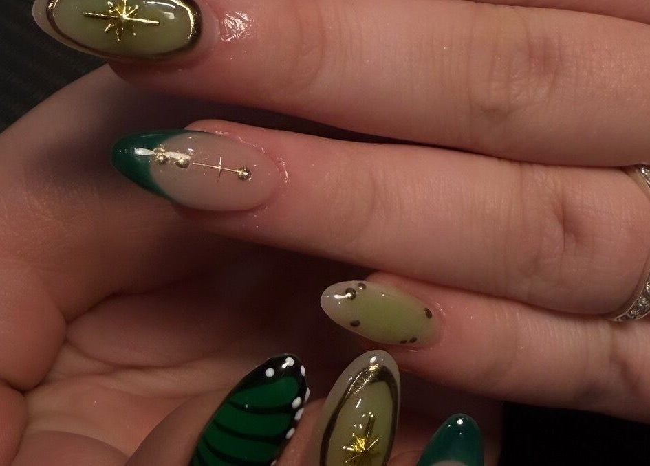 Intricate green and gold nail art at beautybyjblck in Aubin Grove, Western Australia, AU.