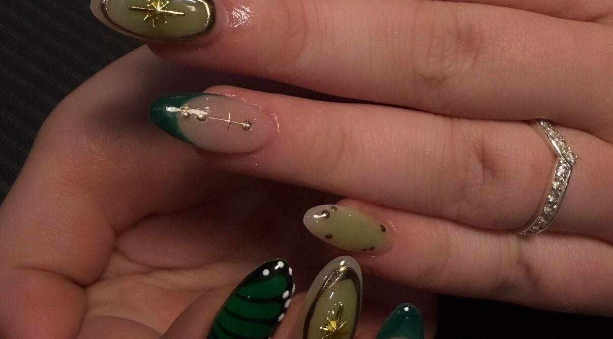 Intricate green and gold nail art at beautybyjblck in Aubin Grove, Western Australia, AU.