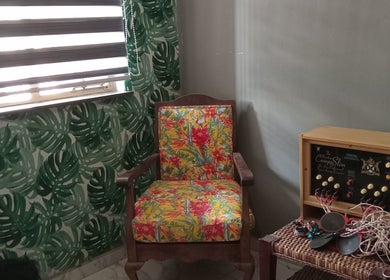 Vintage floral chair and machine at Queen R Spa, Johannesburg, Gauteng, ZA, showcasing unique decor.