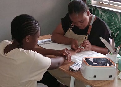Manicure session at Queen R Spa in Johannesburg, Gauteng, ZA, with expert care and stylish setting.