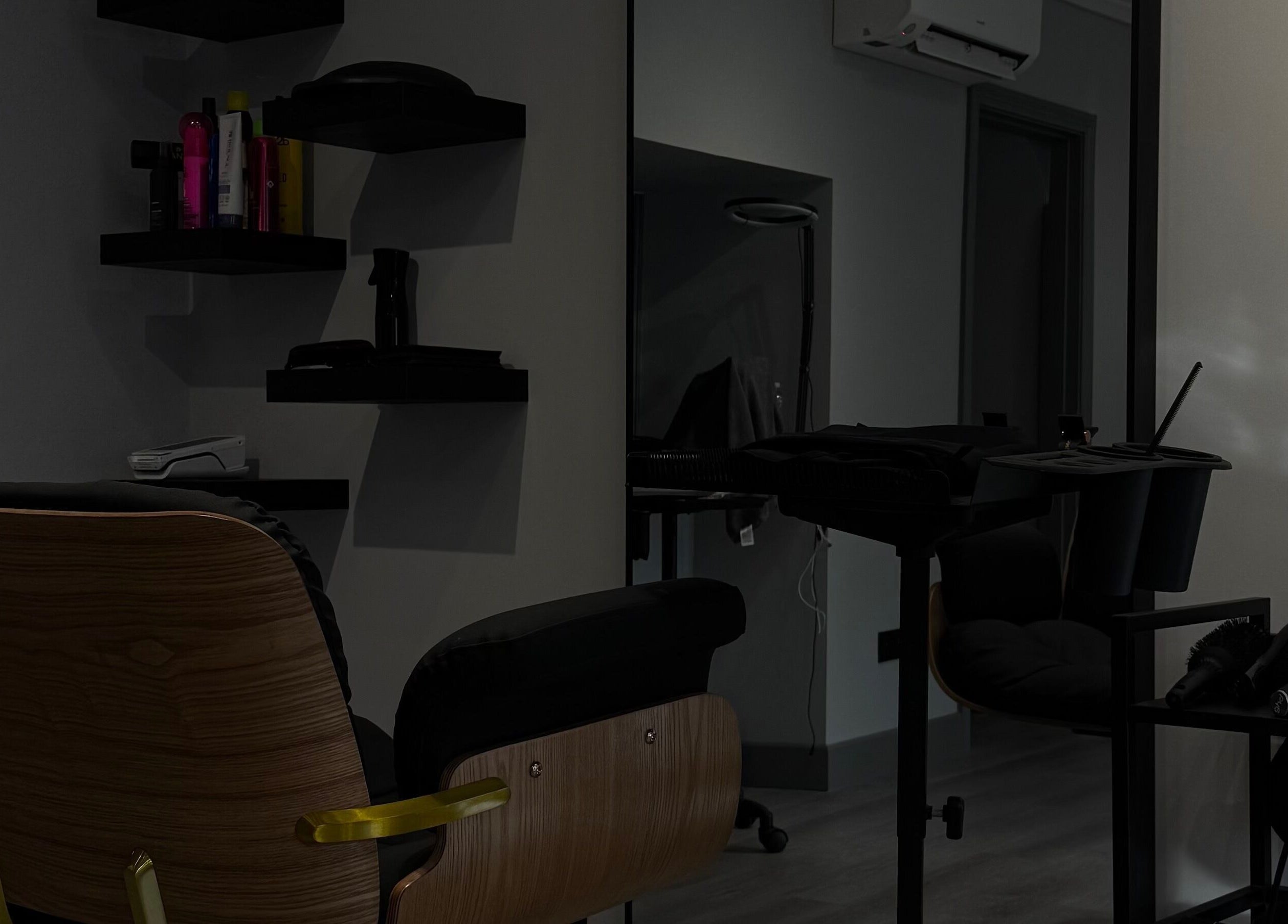 Modern hair salon setup at HAIR Extensions & Treatments, Ennis, County Clare, IE, featuring sleek chair and tools.