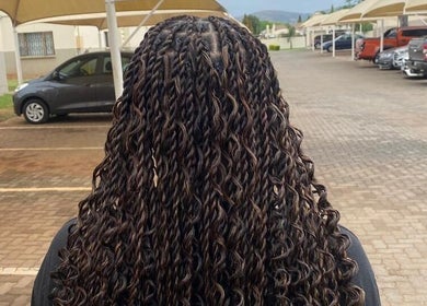 Back view of intricately braided hair at Aura's Aesthetics, Pretoria, Gauteng, ZA.