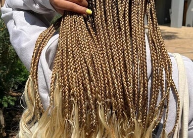 Detailed braids styled at Aura's Aesthetics in Pretoria, Gauteng, ZA, showcasing expert craftsmanship.