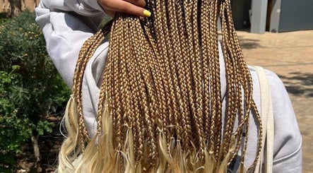 Detailed braids styled at Aura's Aesthetics in Pretoria, Gauteng, ZA, showcasing expert craftsmanship.