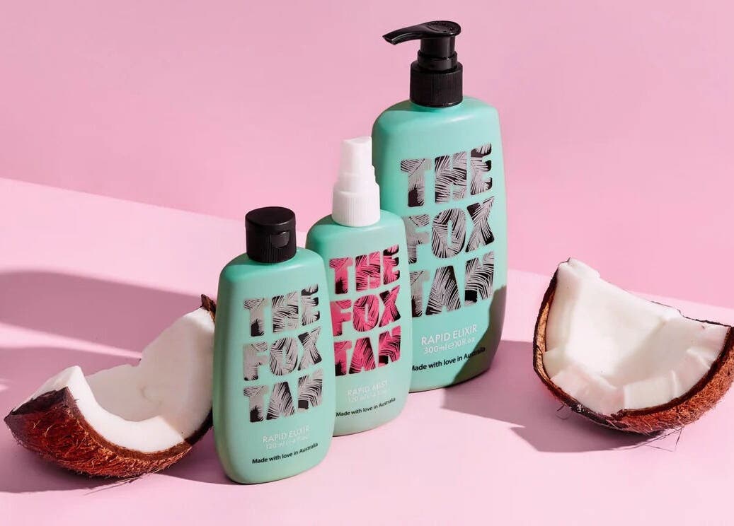 Glow Studio Roodepoort, Gauteng offers vibrant skincare products with coconut on a pink background.