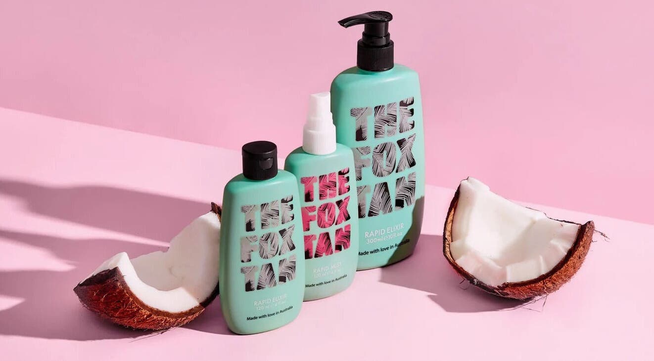 Glow Studio Roodepoort, Gauteng offers vibrant skincare products with coconut on a pink background.