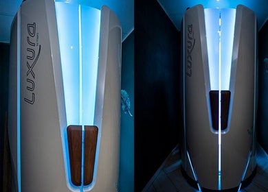 Luxura tanning booth at Glow Studio in Roodepoort, Gauteng, ZA, offering a sleek, modern sunless tanning experience.