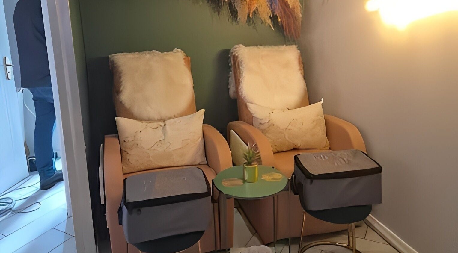 Relaxing lounge chairs at Glow Studio in Roodepoort, Gauteng, ZA, with plush cushions and soft lighting.