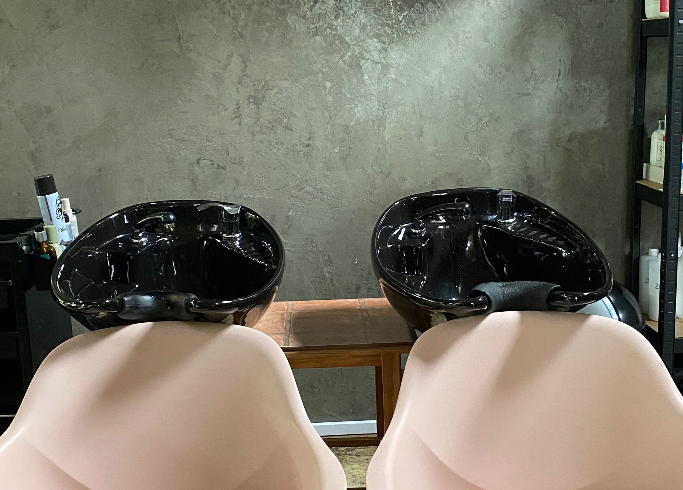 Modern dual wash basins at Roxy At Glow, Pretoria, Gauteng, ZA for premium hair care services.