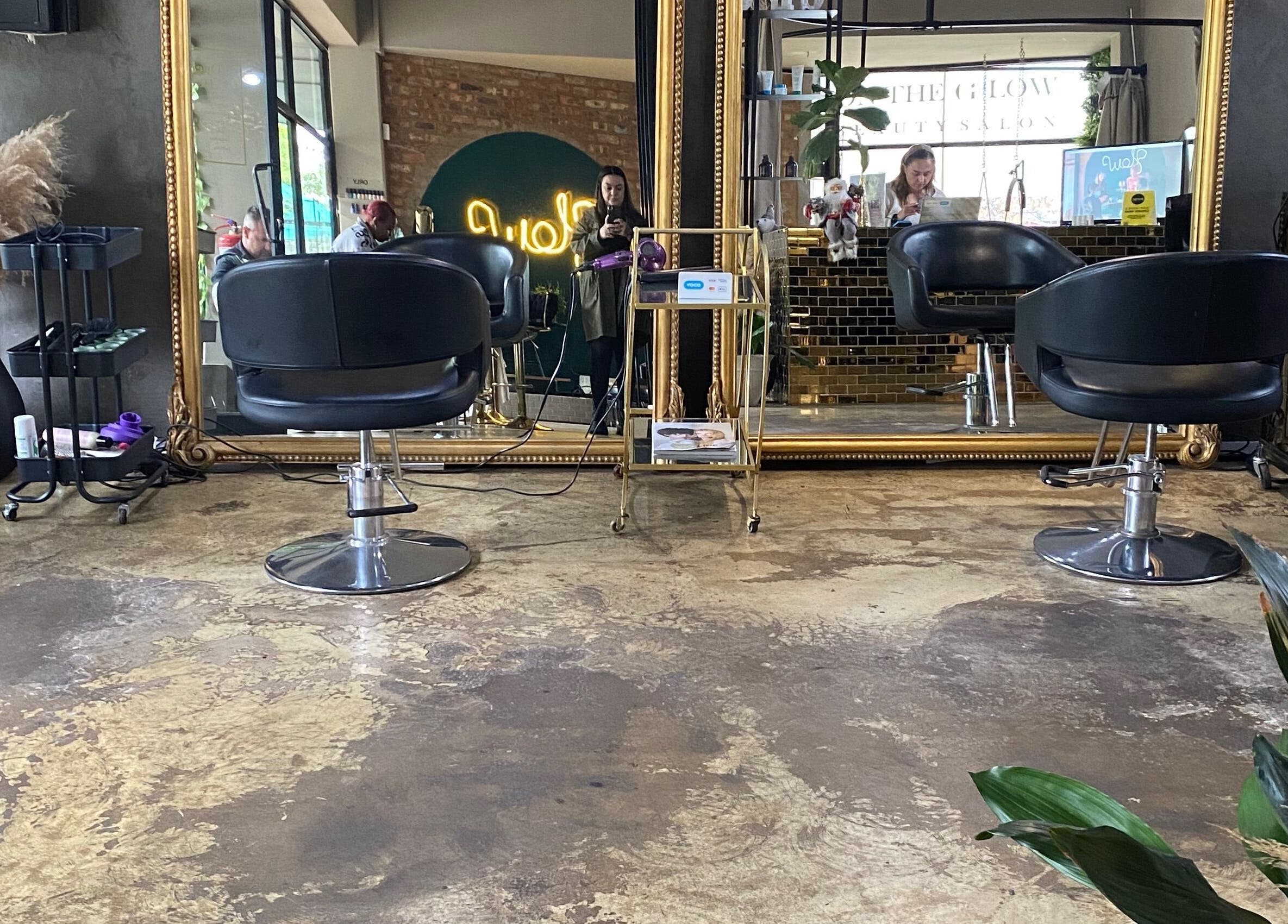 Stylish salon chairs and mirrors at Roxy At Glow, Pretoria, Gauteng, ZA salon interior space.