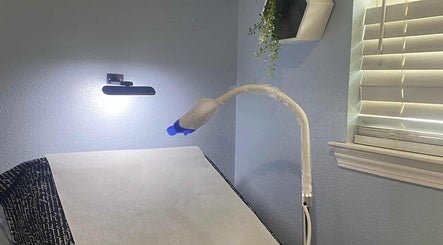 Treatment room at Glow Up Aesthetics in Texas, Texas, US, featuring a modern light setup and inviting ambiance.