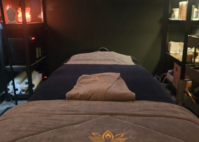 Relaxing treatment room at Kobido Ireland in Carlow, County Carlow, IE, with warm lighting and cozy ambiance.