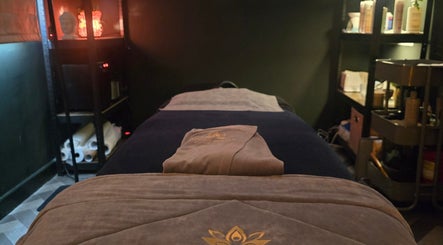 Tranquil massage room at Kobido Ireland, Carlow, County Carlow, IE, featuring cozy linens and ambient lighting.