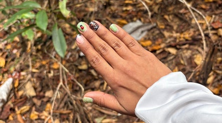Beautiful nail art with earthy tones at Artistry Nail Lounge, Louisville, Kentucky, US.