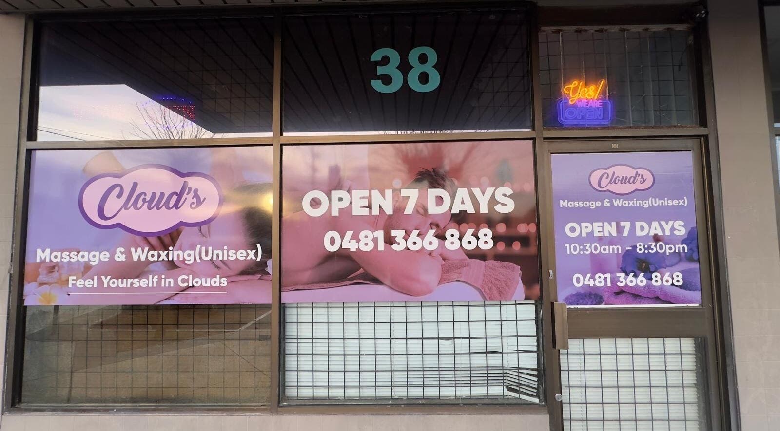 Front view of Clouds Massage and Waxing in Melbourne, Victoria, AU, displaying open hours and contact number.
