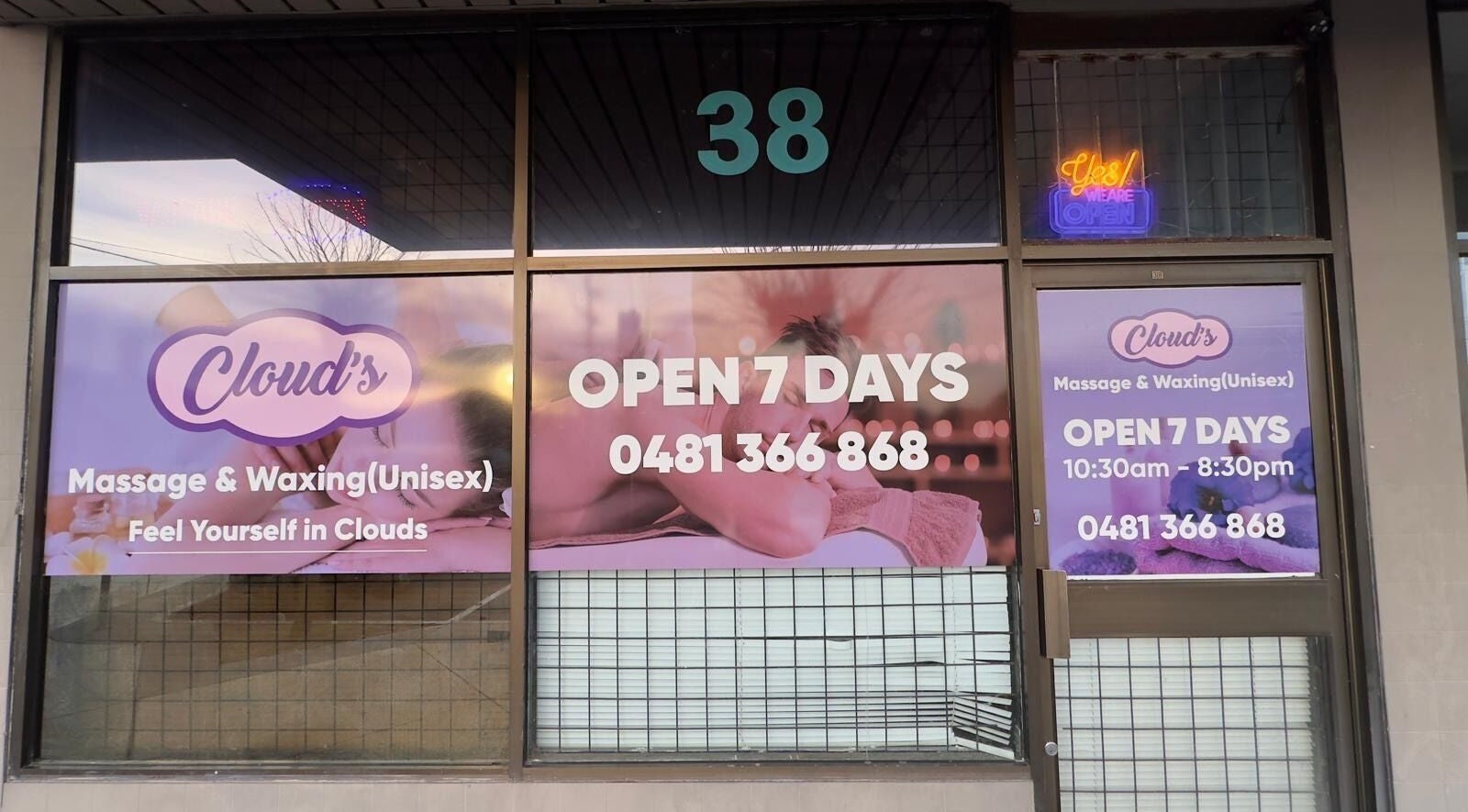 Front view of Clouds Massage and Waxing in Melbourne, Victoria, AU, displaying open hours and contact number.