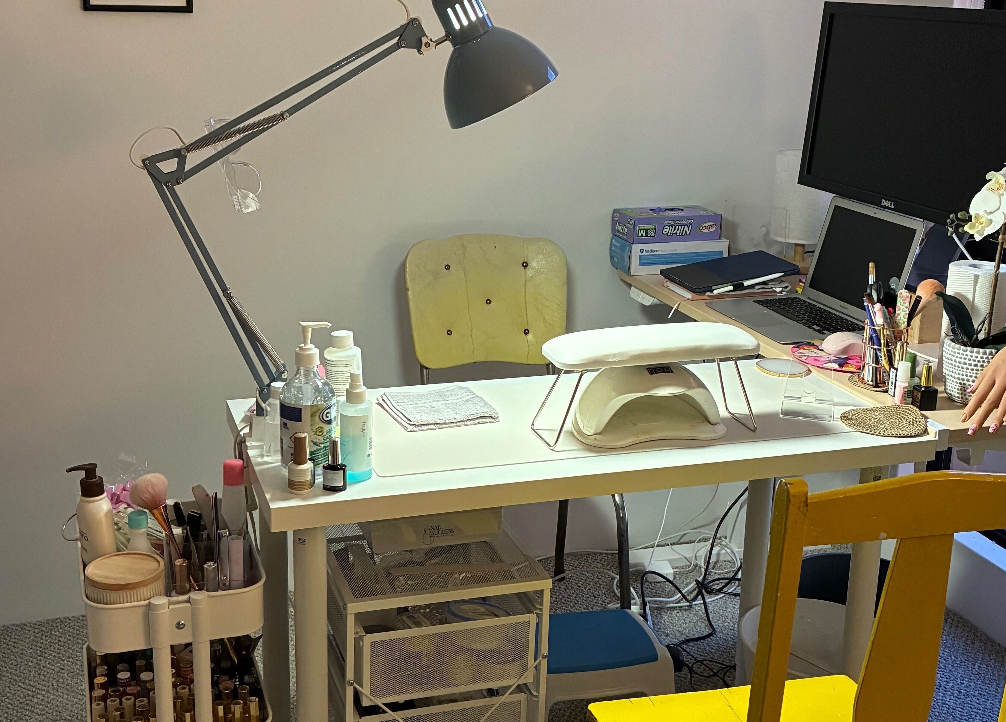 Polished Ember nail studio in Willagee, Western Australia, AU, featuring a manicure desk and beauty tools.