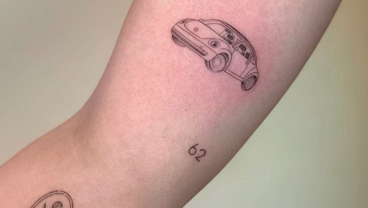 Car tattoo art at TEEMOOINK TATTOO, Surry Hills, New South Wales, AU. Expertly designed automotive tattoo.