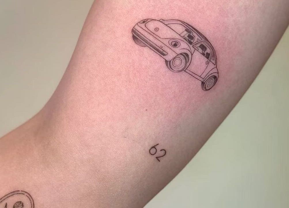 Car tattoo art at TEEMOOINK TATTOO, Surry Hills, New South Wales, AU. Expertly designed automotive tattoo.