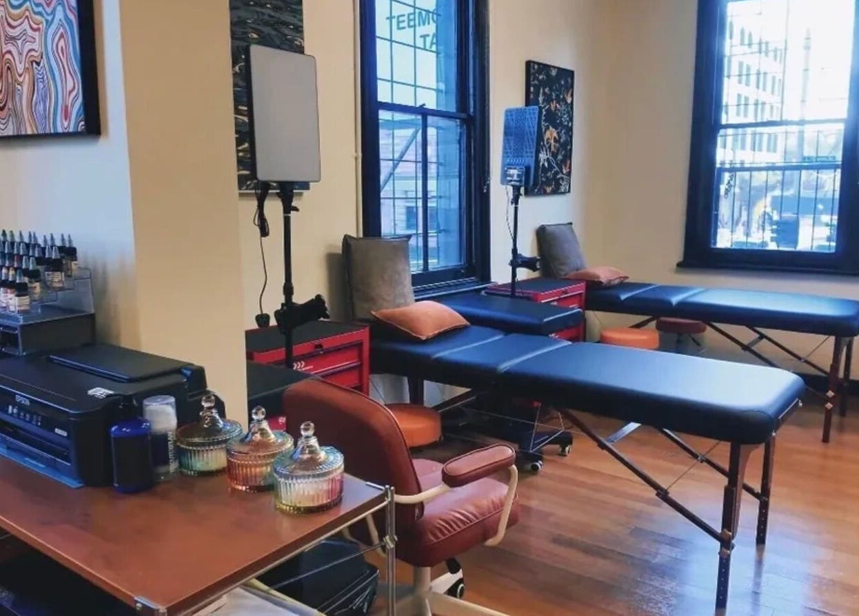 TEEMOOINK TATTOO studio in Surry Hills, New South Wales, AU features cozy tattoo chairs and vibrant art.