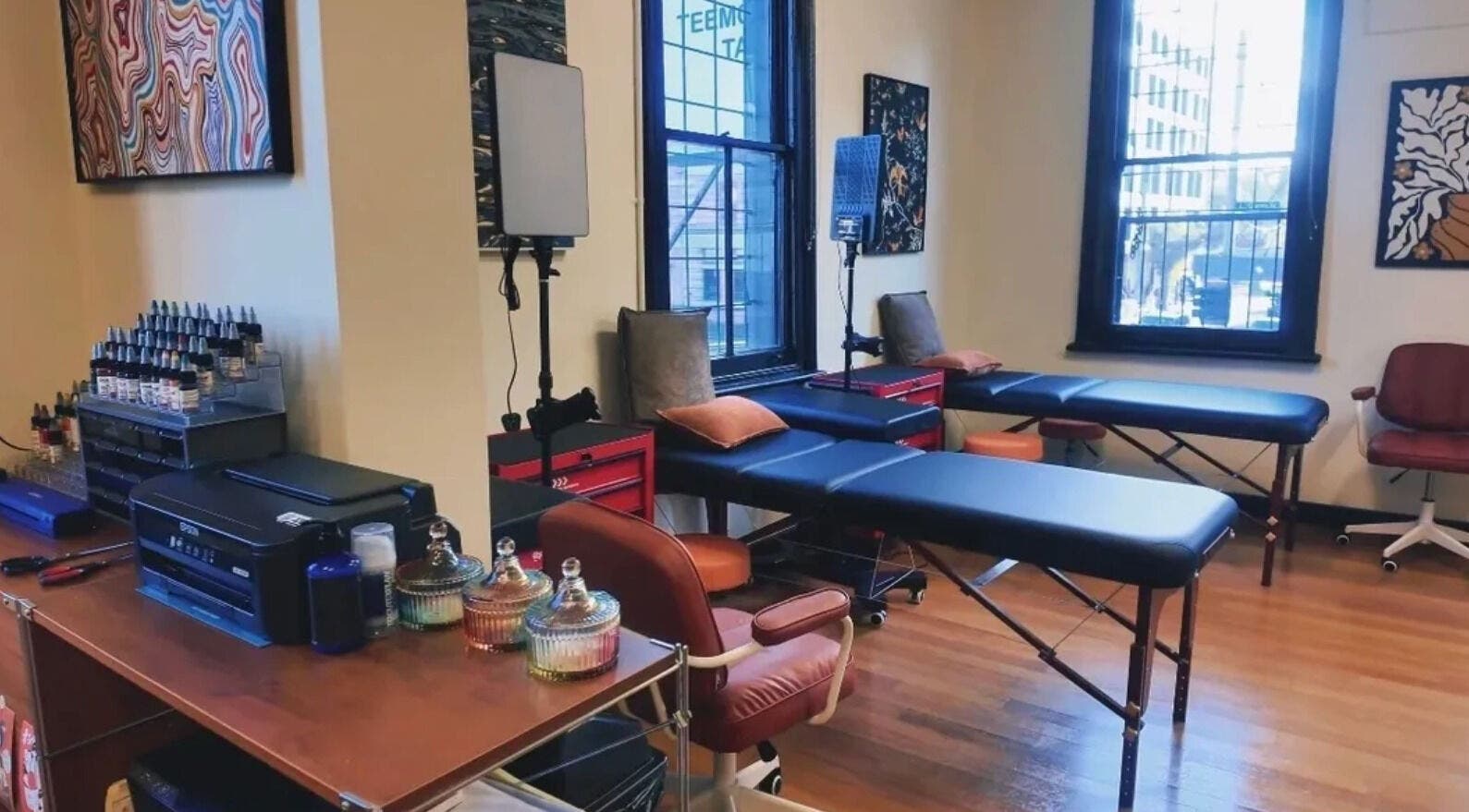 TEEMOOINK TATTOO studio in Surry Hills, New South Wales, AU features cozy tattoo chairs and vibrant art.