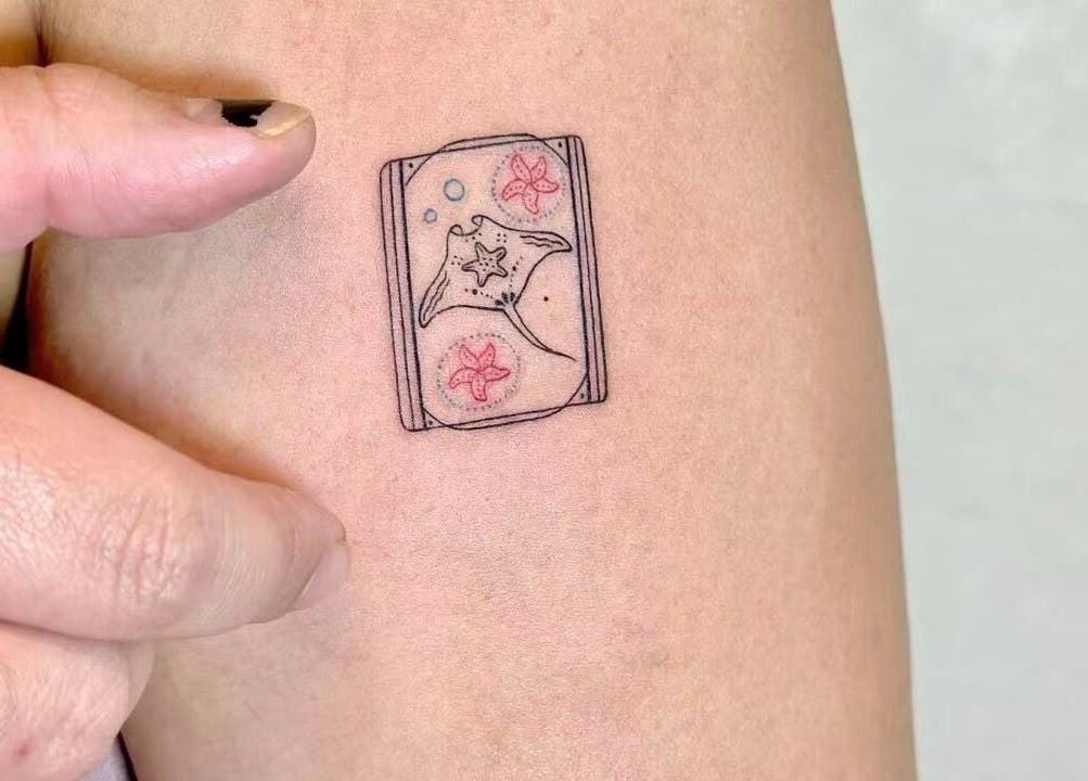 Intricate stingray tattoo by TEEMOOINK TATTOO, Surry Hills, New South Wales, AU, showcasing detailed artistry.