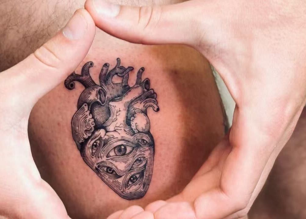 Intricate heart tattoo on skin at TEEMOOINK TATTOO, Surry Hills, New South Wales, AU.