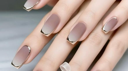 Elegant gradient gel nails with shimmer tips at Gel Nails, Orillia, Ontario, CA.