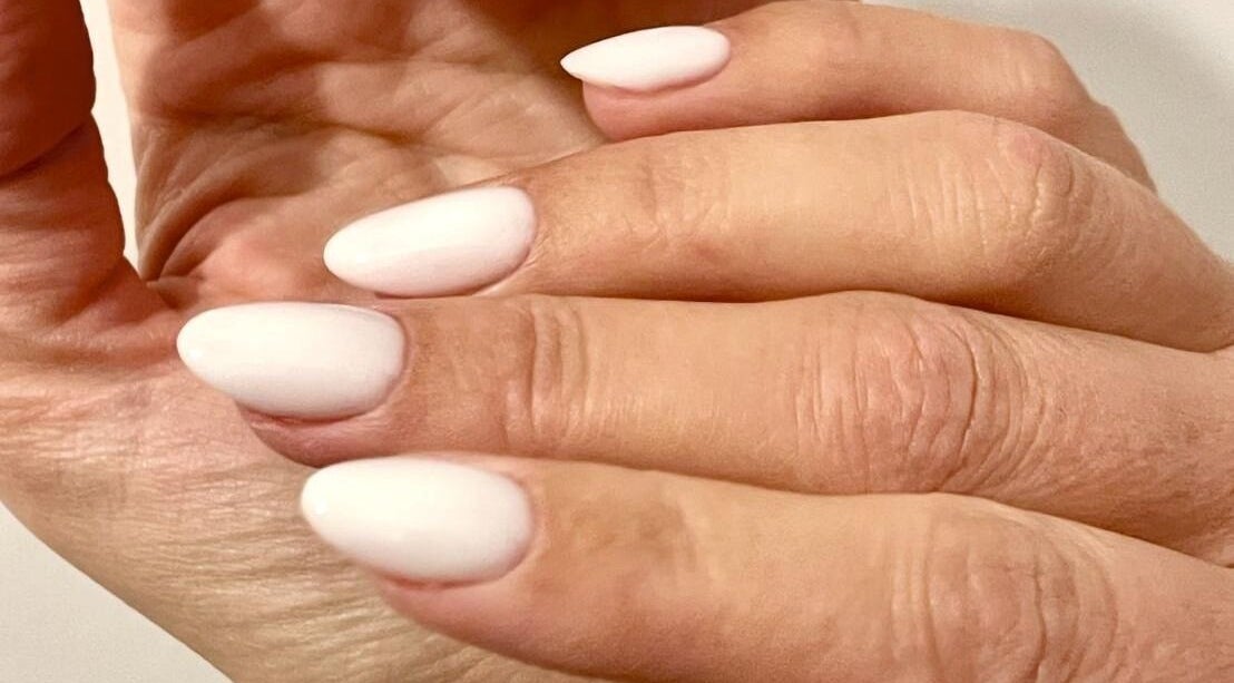 Beautiful white manicured nails at Nail Room, Bromley, England, GB, showcasing elegance and style.
