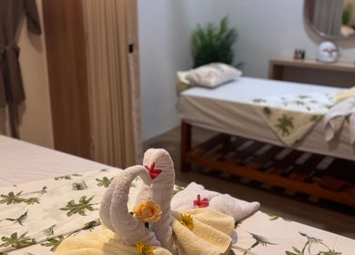 Serene massage room with towel art at reSPAwn Spa Bali, Kec. Kuta Utara, Bali, ID.
