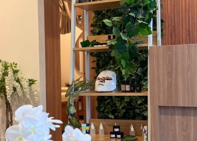 Elegant display at reSPAwn Spa Bali, Kec. Kuta Utara, Bali, ID with beauty products and lush greenery.