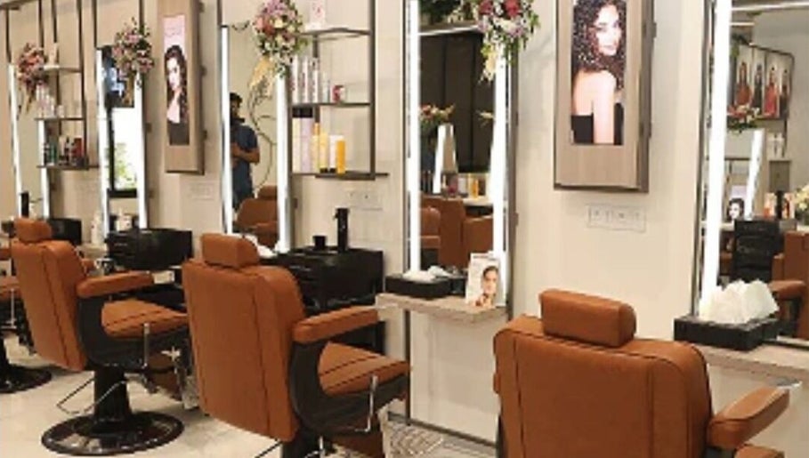 Chic salon interior at Revive beauty salon, Pimpri-Chinchwad, Maharashtra, IN, showcasing elegant styling stations.