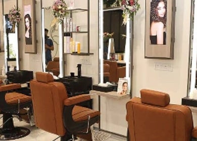 Chic salon interior at Revive beauty salon, Pimpri-Chinchwad, Maharashtra, IN, showcasing elegant styling stations.